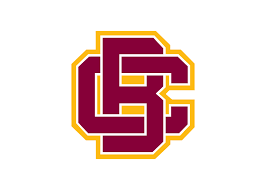 Logo for a college or university featuring bold maroon and gold colors with "CS" intertwined, symbolizing school spirit and identity.